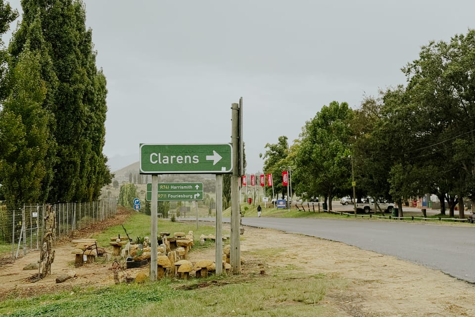 The roadside sign marking the turn into Clarens
