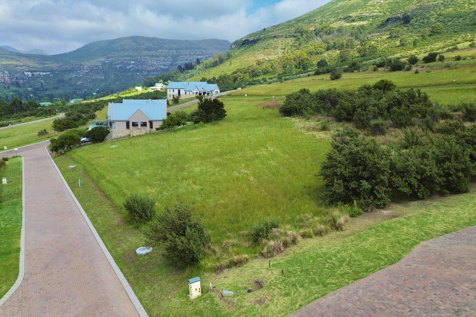 A serviced stand with road frontage at Clarens Mountain Estate, beside a completed home
